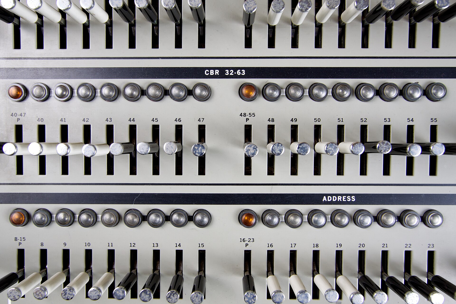 Close-up of the IBM System/360 operator panel showing address register toggle switches and indicator lamps